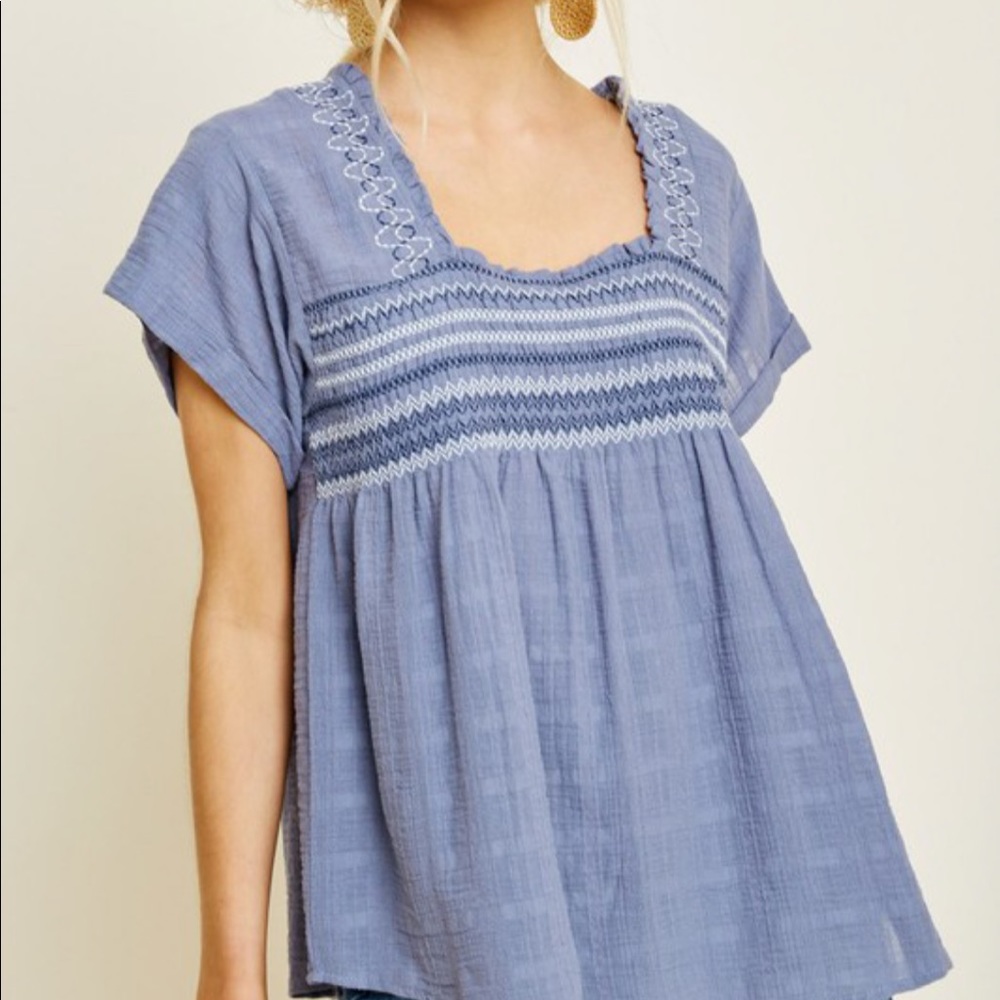 Blue embroidered blouse
